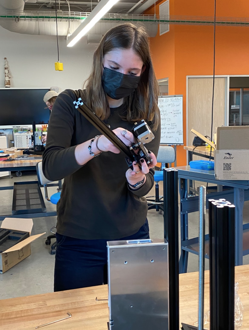 [Allie helping to assemble one of our 3D printers!]